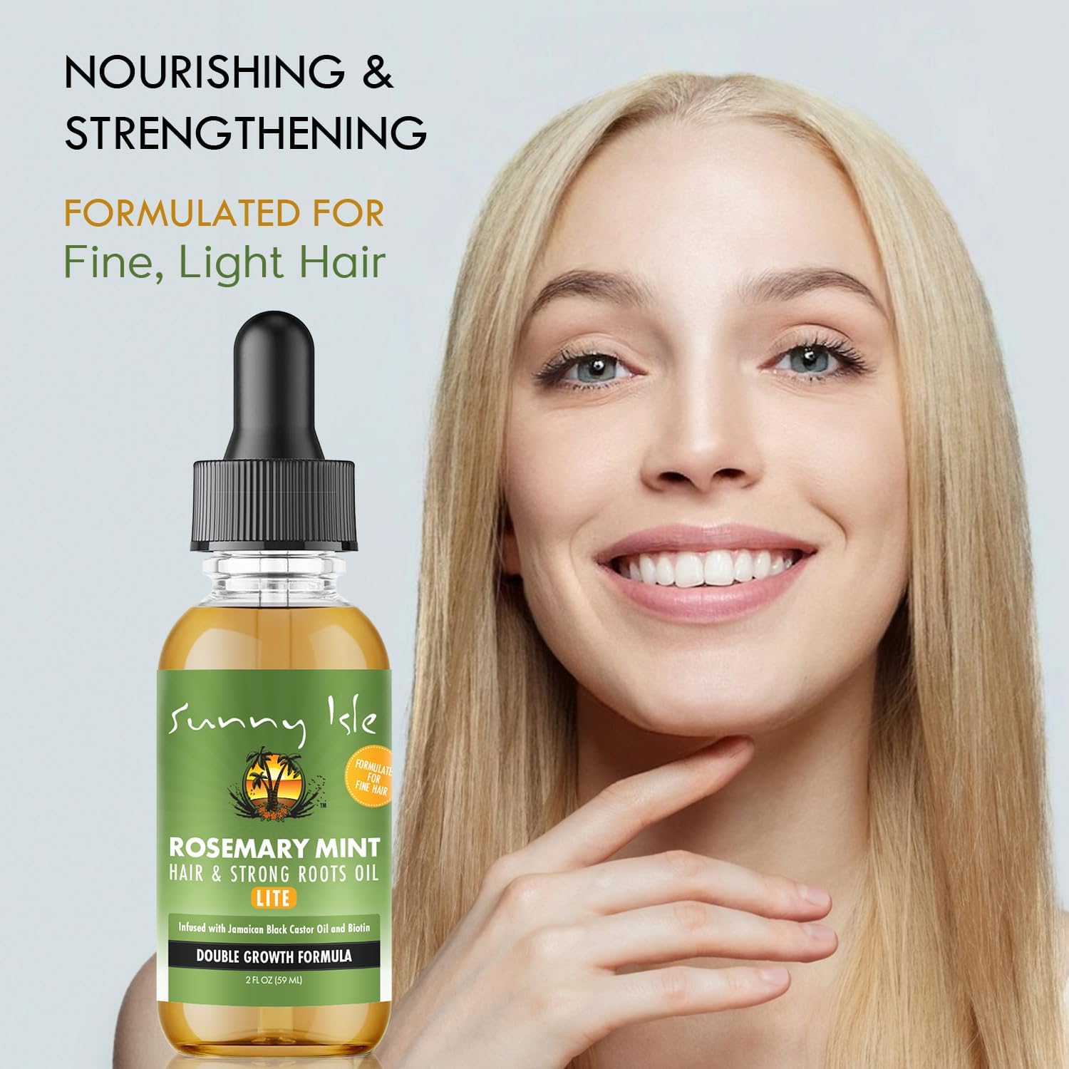 Sunny Isle Rosemary Mint hair oil bottle with a woman holding her hair against a light gray background